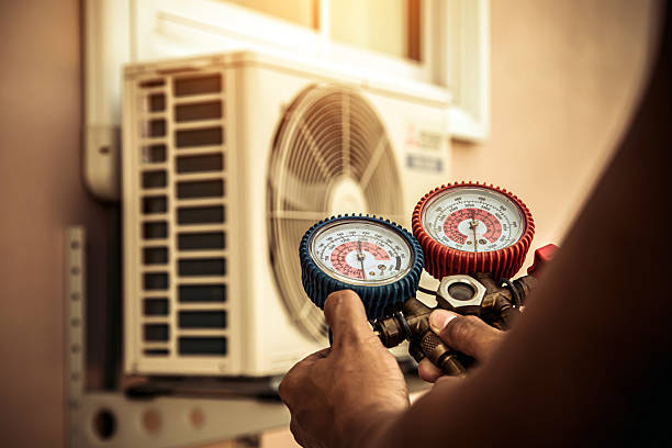 Professional Ac Installation technician working in North Uxbridge, MA
